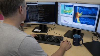 man analysing reports