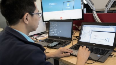 man looking on computer