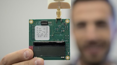 man showing circuit board