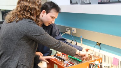 Pablo Ferreyra and a team member working on a project