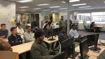 Associates participating in Invigoration Day prepare to break out into smaller groups.